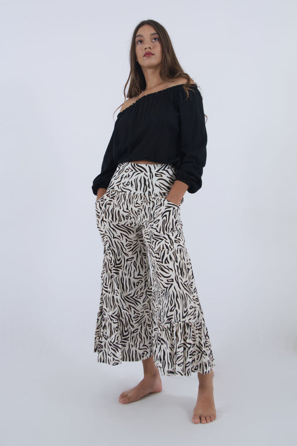 Our Gypsy off shoulder top with long sleeves, in black rayon.