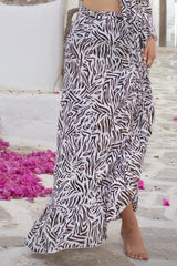 Our Skirt Wrap in zebra pattern, a light & stylish summer look.