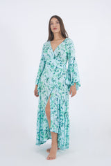 Our Wrap trumpet Long dress in green floral pattern, ideal for pool parties and evening outings.