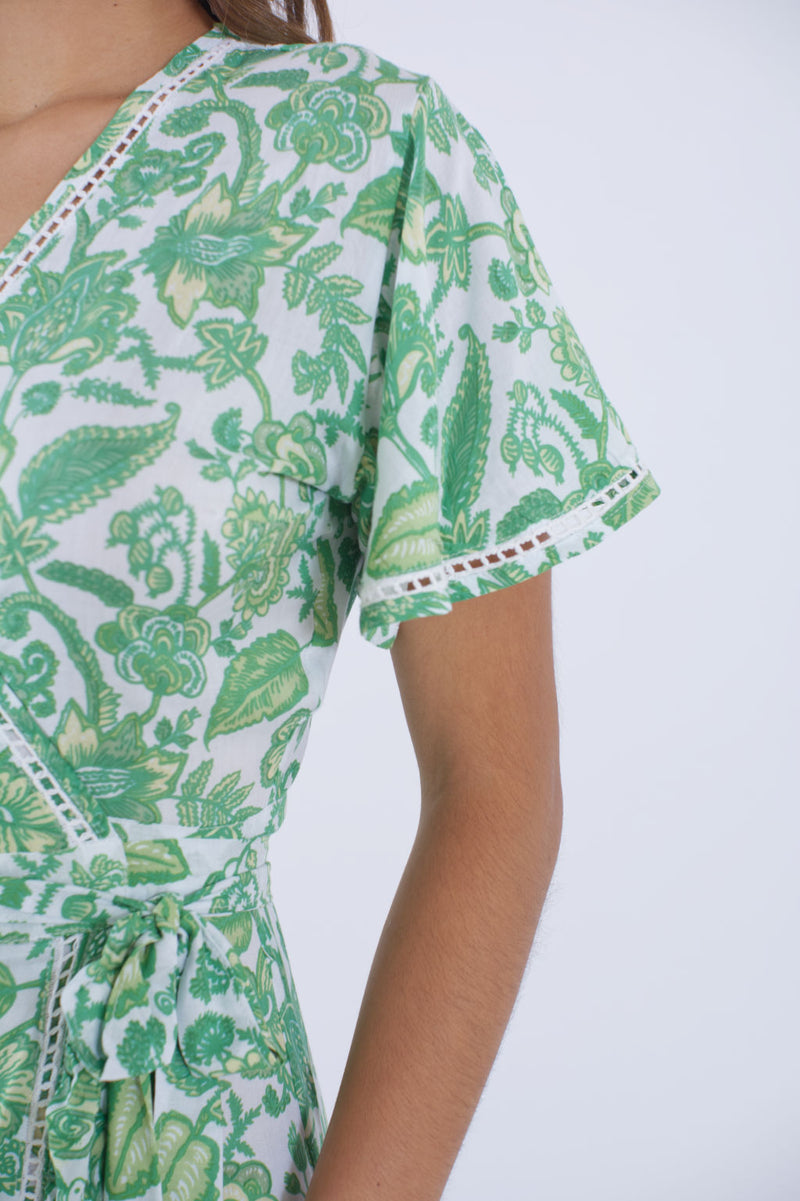 Sleeve detail of our Palma green floral dress.