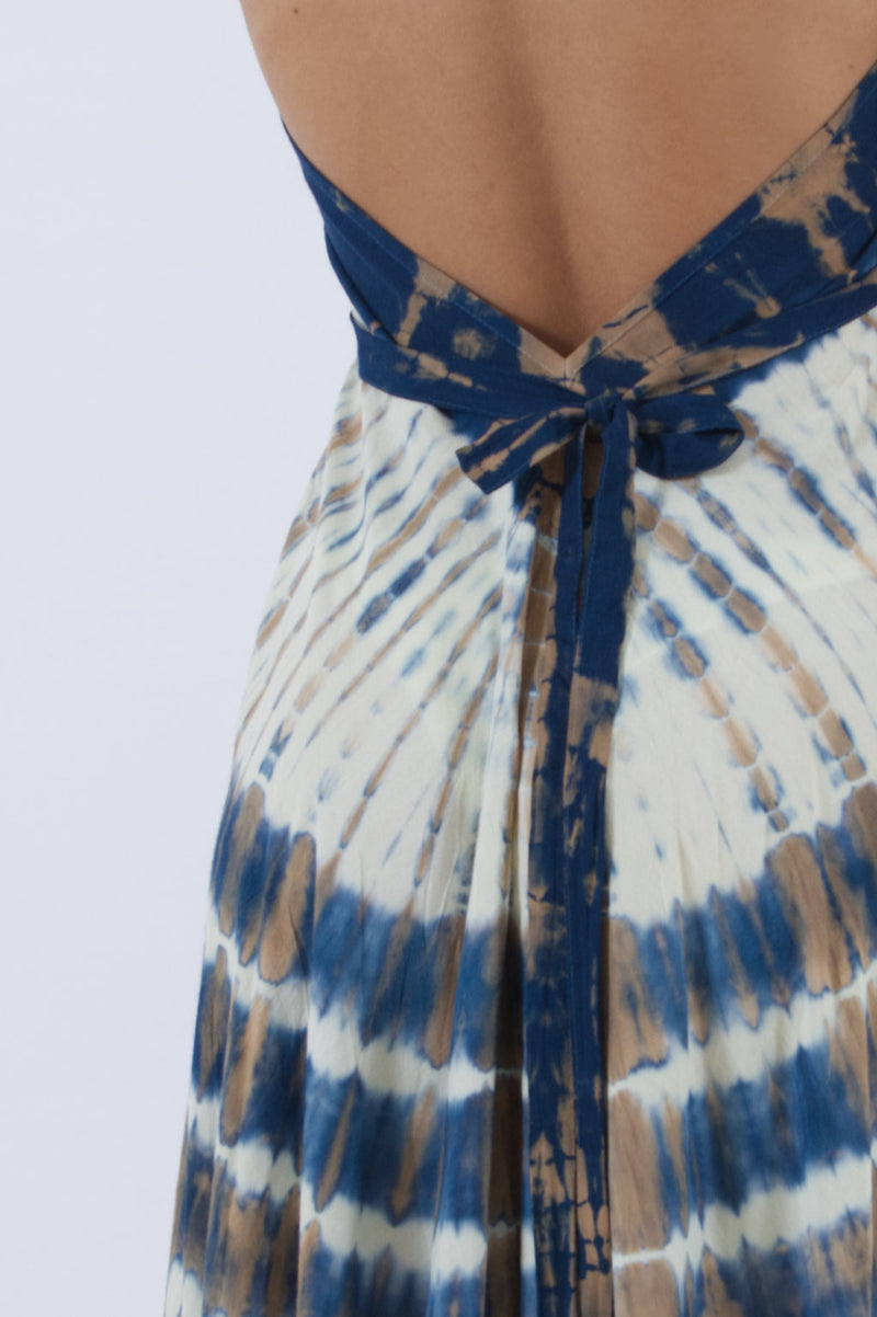 Detail of our low back summer dress in blue and white tie dye print.